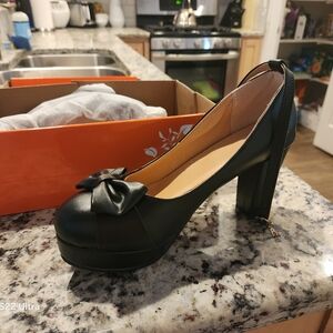 Chic Black Heels with Bow Accent